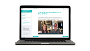 Laptop showing RV transition course dashboard with video lessons and planning tools